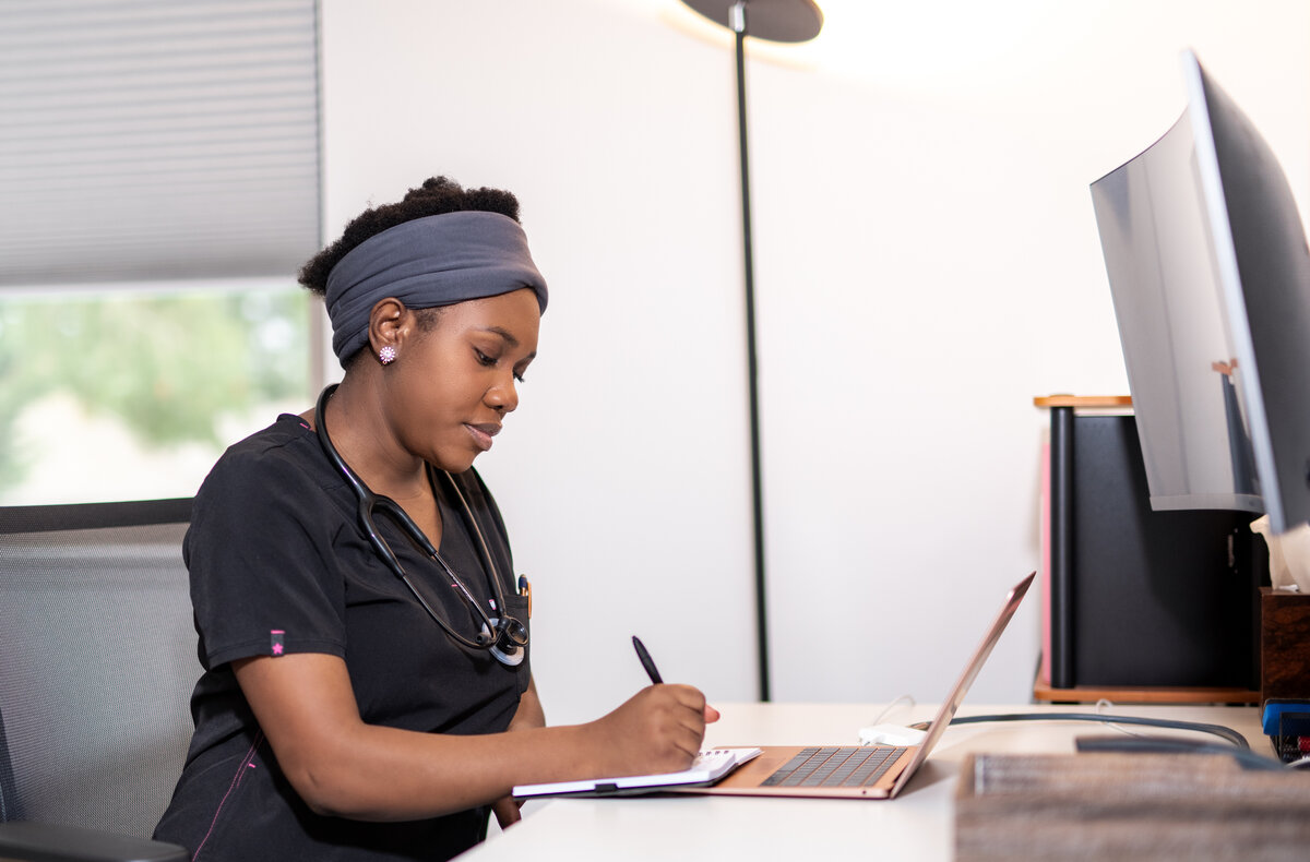 Caregiver sharing a compassionate moment with senior resident